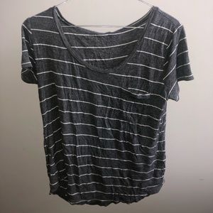 Grey and white stripped t-shirt.